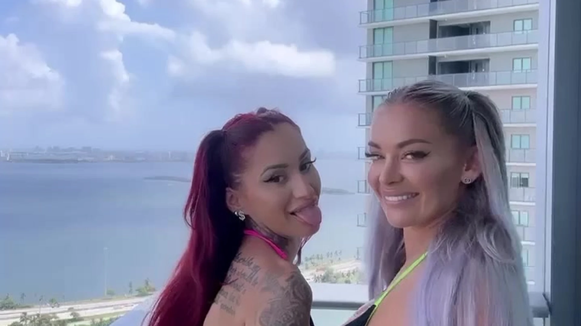 Hayley Davies plays with her lesbian friend outdoor