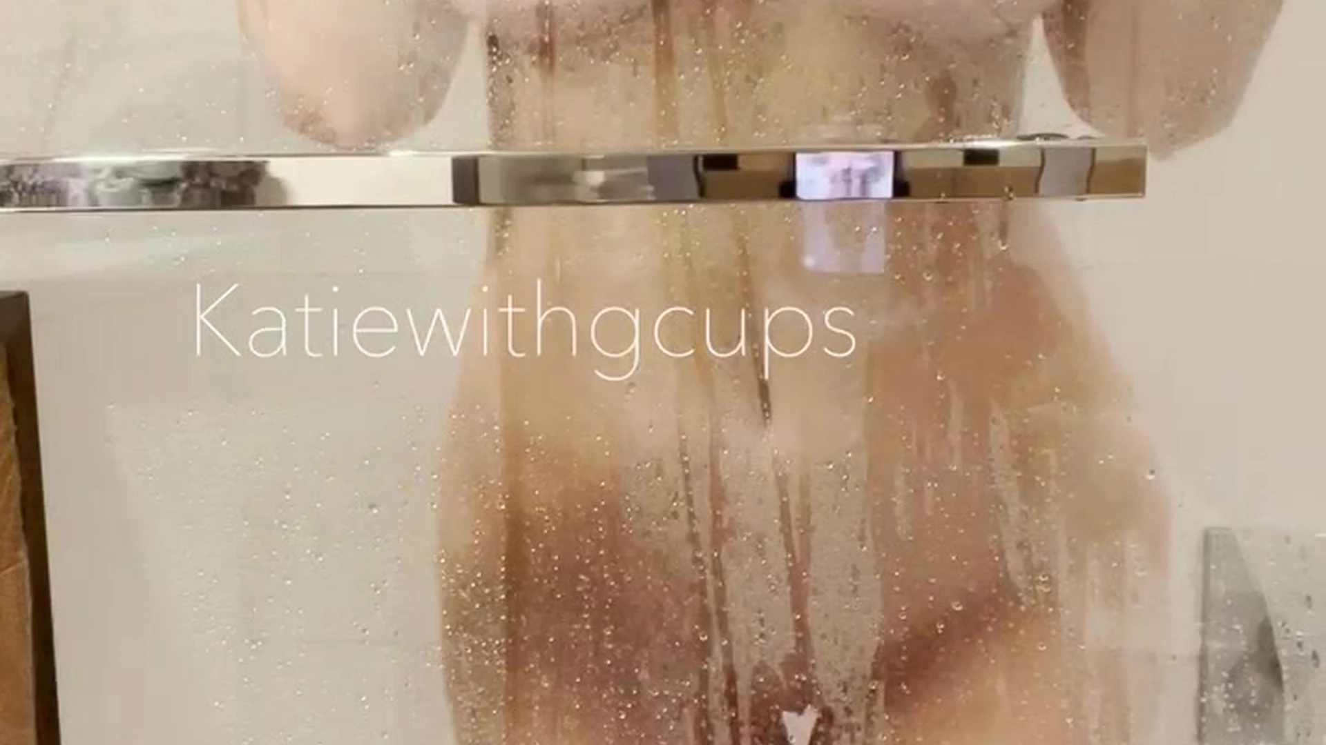 onlyfans model katiecups leaked video of her playing with her tits in the showr