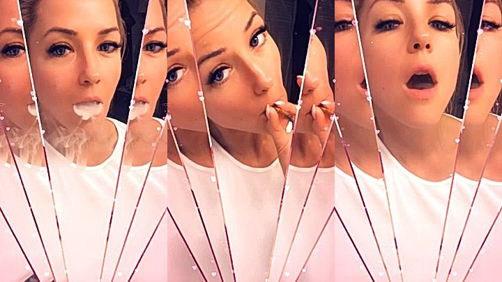 Kit Mercer shows her pretty face in broken mirror