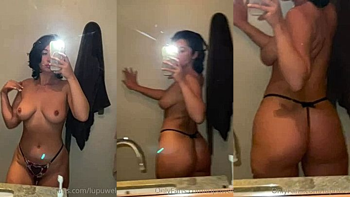 onlyfans model LupuWellness do mirror selfie of her huge tits and booty