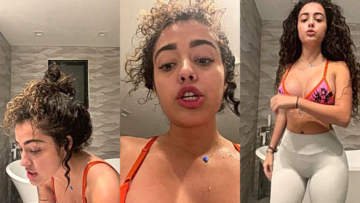 Malu Trevejo is having a great time undressing to show off her amazing body
