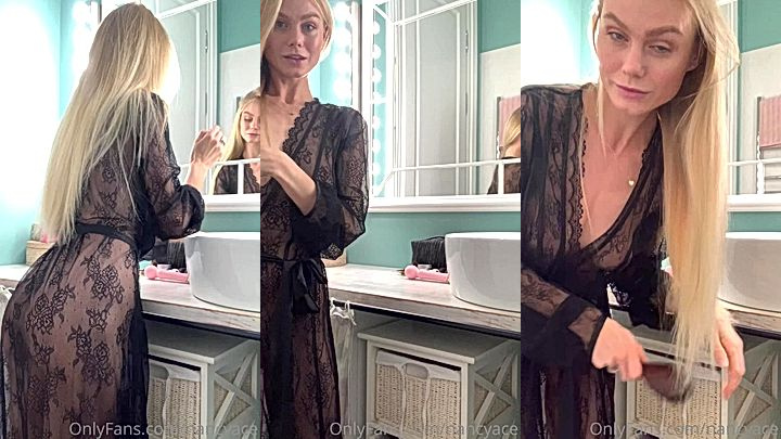 onlyfans model Nancy Ace in a transparent night gown combing her hair